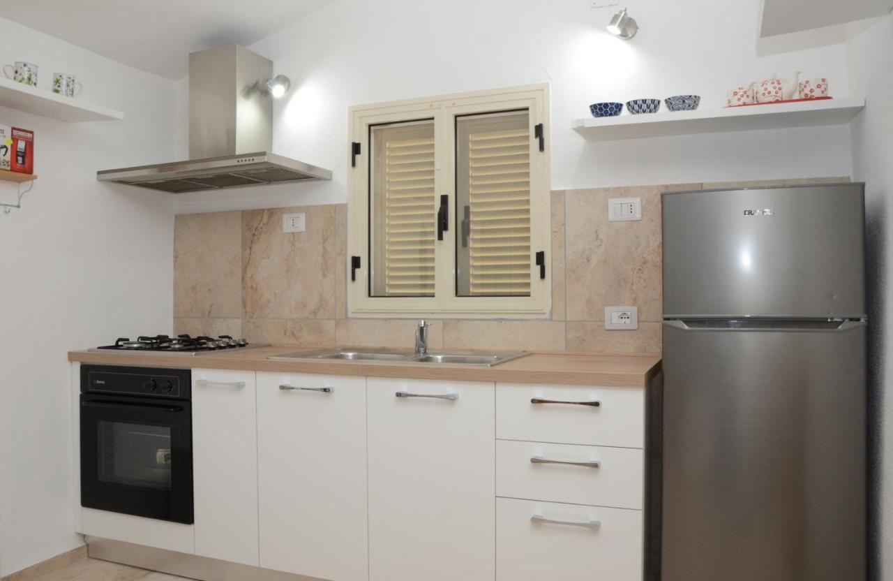 Apartments Villa Corrias กาลา ลีเบรอตโต ภายนอก รูปภาพ